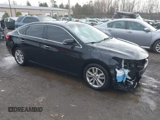 2014 Toyota Avalon Limited z VIN 4T1BK1EB9EU130373, wystawiony jako IAAI lot #41150478 z przebiegiem 142 863 mil mil oraz . Historia ofert i sprzedaży dostępna na DreamBid. Obrazek 1.