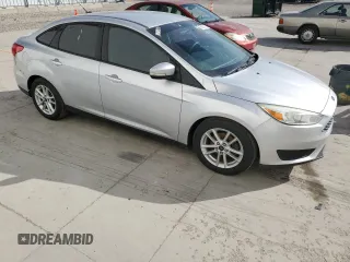 2016 Ford Focus SE with VIN 1FADP3F28GL270003, listed as a Copart auction lot 51852715 with 157,665 mi miles and Salvage Title. Bid and sale history available at DreamBid. Image 4.