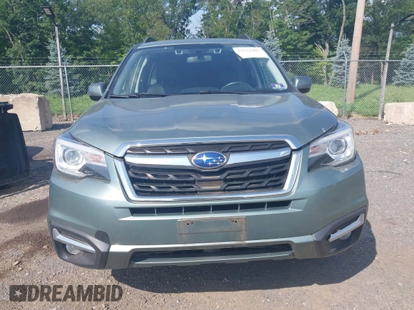 2017 Subaru Forester Touring with VIN JF2SJAWC8HH579492, listed as a IAAI auction lot 42571986 with 57,228 mi miles and . Bid and sale history available at DreamBid. Image 12.