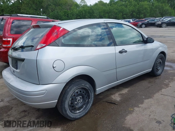 2007 Ford Focus S with VIN 1FAFP31N97W218727, listed as a IAAI auction lot 42183392 with 135,456 mi miles and . Bid and sale history available at carsss.com. Image 4.