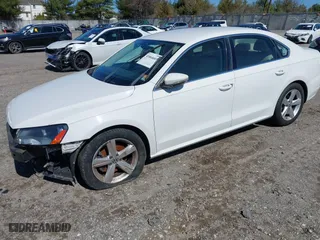 2012 Volkswagen Passat SE with VIN 1VWBP7A38CC030837, listed as a IAAI auction lot 41864669 with 169,816 mi miles. Bid and sale history available at carsss.com. Image 2.