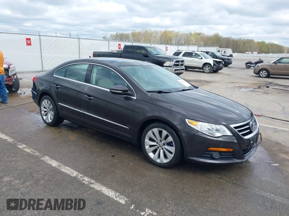 2010 Volkswagen CC Lux Plus with VIN WVWHN7AN6AE541937, listed as a IAAI auction lot 42018765 with 107,110 mi miles. Bid and sale history available at carsss.com. Image 1.