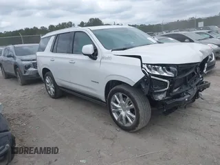 2023 Chevrolet Tahoe High Country with VIN 1GNSCTKL1PR544951, listed as a IAAI auction lot 42113529 with 33,106 mi miles and . Bid and sale history available at DreamBid. Image 1.