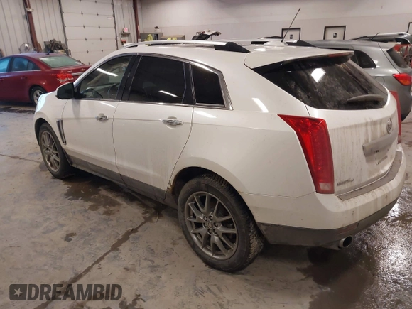 2015 Cadillac SRX Premium Collection with VIN 3GYFNGE32FS564168, listed as a IAAI auction lot 41355787 with 182,949 mi miles. Bid and sale history available at carsss.com. Image 3.