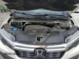 2019 Honda Ridgeline RTL-E with VIN 5FPYK3F74KB039057, listed as a Copart auction lot 57350525 with 105,102 mi miles and Salvage title. Bid and sale history available at DreamBid. Image 11.