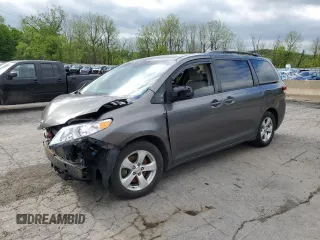 2014 Toyota Sienna LE AAS с VIN 5TDKK3DC9ES457404, выставлен на аукционе Copart как лот 55666405 с пробегом Не указан миль и Списание • Salvage title. История ставок и продаж доступна на DreamBid. Изображение 1.