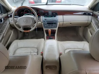 2004 Cadillac DeVille DTS z VIN 1G6KF57944U117834, wystawiony jako Copart lot #89320975 z przebiegiem 149 820 mil mil oraz Szkody całkowita. Historia ofert i sprzedaży dostępna na DreamBid. Obrazek 8.
