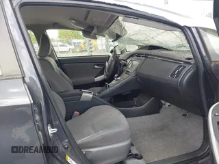 2015 Toyota Prius Four z VIN JTDKN3DU2F0439833, wystawiony jako IAAI lot #42216345 z przebiegiem 96 872 mil mil oraz . Historia ofert i sprzedaży dostępna na DreamBid. Obrazek 5.