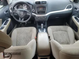 2012 Dodge Journey SXT with VIN 3C4PDDBG4CT289718, listed as a Copart auction lot 61219365 with 159,254 mi miles and Salvage title. Bid and sale history available at DreamBid. Image 8.