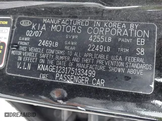 2007 Kia Optima LX with VIN KNAGE123175133499, listed as a IAAI auction lot 41958955 with 132,480 mi miles. Bid and sale history available at carsss.com. Image 9.