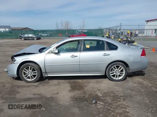 2014 Chevrolet Impala LTZ with VIN 2G1WC5E30E1120094, listed as a IAAI auction lot 41909136 with 117,922 mi miles and . Bid and sale history available at DreamBid. Image 14.