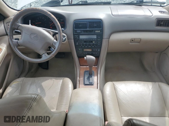 1998 Lexus ES 300 with VIN JT8BF28G4W5021187, listed as a Copart auction lot 60317445 with 258,403 mi miles and Salvage title. Bid and sale history available at DreamBid. Image 8.