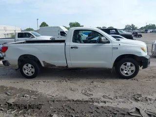 2010 Toyota Tundra with VIN 5TFLU5F10AX022832, listed as a IAAI auction lot 42504366 with 223,392 mi miles and . Bid and sale history available at DreamBid. Image 13.