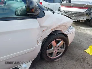 2005 Dodge Caravan SXT with VIN 2D4GP44L15R224531, listed as a IAAI auction lot 41590755 with 141,214 mi miles and . Bid and sale history available at DreamBid. Image 13.