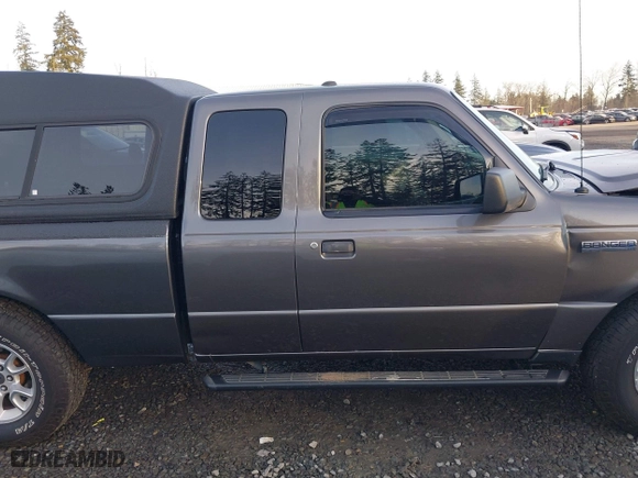 2011 Ford Ranger XLT with VIN 1FTLR4FE6BPA39117, listed as a IAAI auction lot 41388849 with 215,294 mi miles. Bid and sale history available at carsss.com. Image 13.