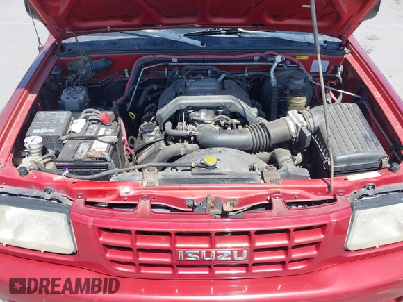 1999 Isuzu Rodeo S z VIN 4S2CK58WXX4346156, wystawiony jako IAAI lot #42328951 z przebiegiem 196 182 mil mil oraz . Historia ofert i sprzedaży dostępna na DreamBid. Obrazek 10.