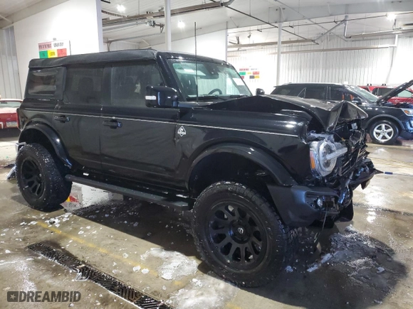 2023 Ford Bronco with VIN 1FMEE5BP5PLA99823, listed as a Copart auction lot 41954945 with 58,938 mi miles and Salvage Title. Bid and sale history available at carsss.com. Image 4.