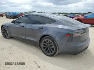 2021 Tesla Model S Long Range with VIN 5YJSA1E51MF453924, listed as a Copart auction lot 53486495 with 48,599 mi miles and Salvage title. Bid and sale history available at DreamBid. Image 2.