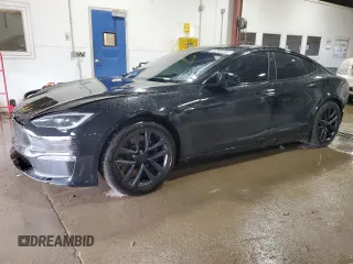 2022 Tesla Model S with VIN 5YJSA1E58NF478370, listed as a Copart auction lot 52300285 with 65,685 mi miles and Salvage Title. Bid and sale history available at DreamBid. Image 1.