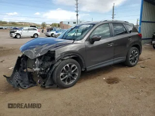 2016 Mazda CX-5 Grand Touring with VIN JM3KE4DY1G0700354, listed as a Copart auction lot 54343295 with 120,237 mi miles and Salvage Title. Bid and sale history available at DreamBid. Image 1.