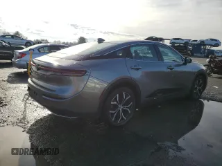 2023 Toyota Crown XLE z VIN JTDAAAAFXP3008724, wystawiony jako Copart lot #85527824 z przebiegiem 16 687 mil mil oraz Szkoda całkowita • Salvage title. Historia ofert i sprzedaży dostępna na DreamBid. Obrazek 3.