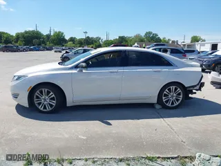 2014 Lincoln MKZ Hybrid with VIN 3LN6L2LU3ER819681, listed as a IAAI auction lot 41867338 with 149,964 mi miles. Bid and sale history available at carsss.com. Image 15.
