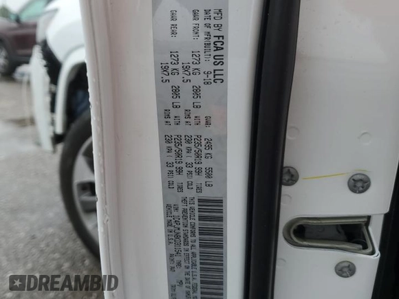 2019 Jeep Cherokee Overland with VIN 1C4PJMJN8KD311541, listed as a Copart auction lot 71706494 with Not provided miles and Salvage title. Bid and sale history available at DreamBid. Image 14.
