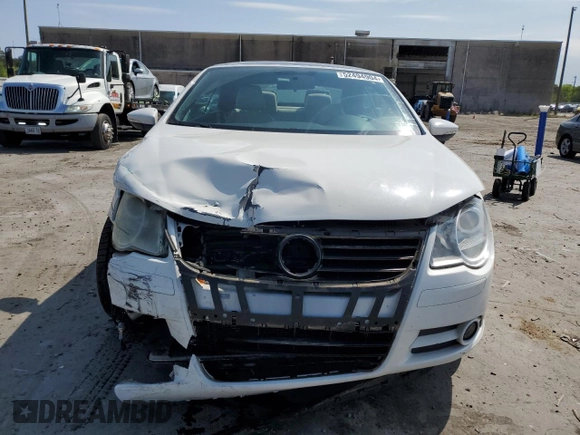 2011 Volkswagen Eos with VIN WVWAW7AH7BV003659, listed as a Copart auction lot 52494904 with 122,927 mi miles and Salvage Title. Bid and sale history available at DreamBid. Image 5.
