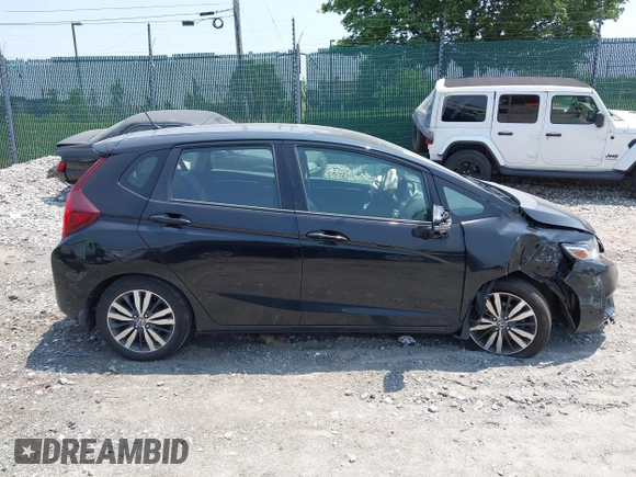 2015 Honda Fit EX-L z VIN 3HGGK5H85FM721566, wystawiony jako IAAI lot #42423777 z przebiegiem 138 825 mil mil oraz . Historia ofert i sprzedaży dostępna na DreamBid. Obrazek 14.