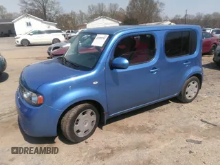 2013 Nissan Cube SL z VIN JN8AZ2KR3DT303672, wystawiony jako IAAI lot #41899753 z przebiegiem 117 840 mil mil oraz . Historia ofert i sprzedaży dostępna na DreamBid. Obrazek 2.