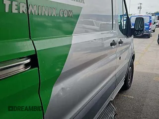 2017 Ford Transit Cargo z VIN 1FTYE1CMXHKA48291, wystawiony jako IAAI lot #42731289 z przebiegiem 142 973 mil mil oraz . Historia ofert i sprzedaży dostępna na DreamBid. Obrazek 16.