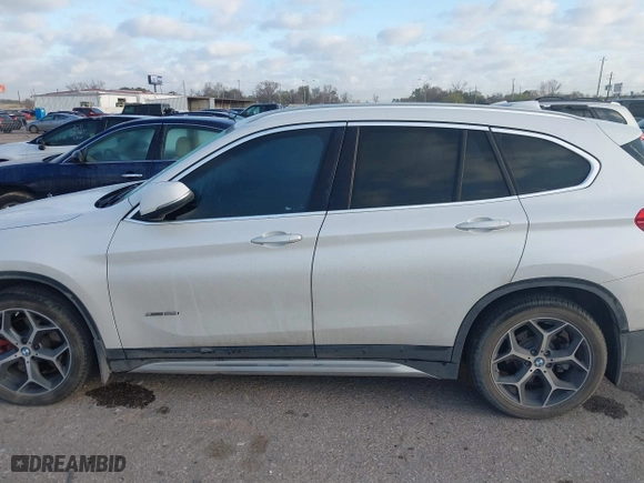 2016 BMW X1 xDrive28i with VIN WBXHT3C3XGP889461, listed as a IAAI auction lot 41757627 with 105,681 mi miles. Bid and sale history available at carsss.com. Image 14.