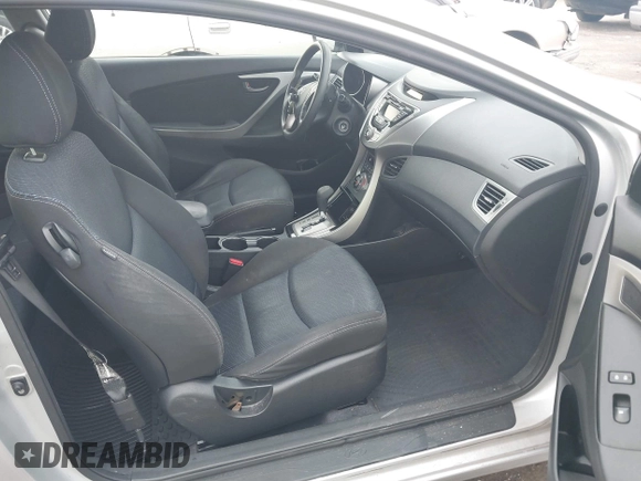 2013 Hyundai Elantra Coupe SE with VIN KMHDH6AE8DU011104, listed as a IAAI auction lot 41588963 with 112,726 mi miles. Bid and sale history available at carsss.com. Image 5.