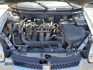 2004 Dodge Neon SXT with VIN 1B3ES56C34D551974, listed as a Copart auction lot 46829235 with 212,829 mi miles and Salvage Title. Bid and sale history available at DreamBid. Image 11.