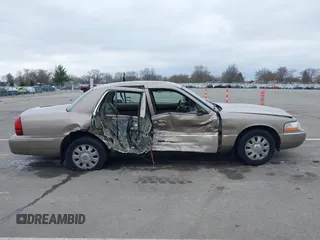 2004 Mercury Grand Marquis LS Premium z VIN 2MEFM75W14X643516, wystawiony jako IAAI lot #42007171 z przebiegiem 213 531 mil mil oraz . Historia ofert i sprzedaży dostępna na DreamBid. Obrazek 13.