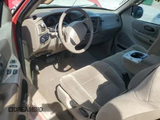 2001 Ford F-150 XL z VIN 1FTRX17W71KC65961, wystawiony jako Copart lot #49169655 z przebiegiem 110 572 mil mil oraz Szkoda całkowita • Salvage title. Historia ofert i sprzedaży dostępna na DreamBid. Obrazek 8.