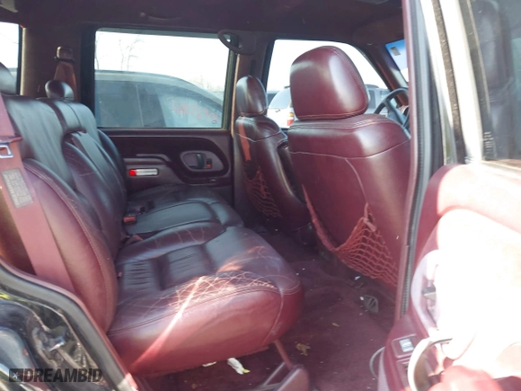 1996 Chevrolet Tahoe with VIN 1GNEK13RXTJ418622, listed as a IAAI auction lot 41879760 with 349,211 mi miles. Bid and sale history available at carsss.com. Image 8.