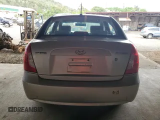 2011 Hyundai Accent GLS z VIN KMHCN4AC0BU614214, wystawiony jako Copart lot #51369585 z przebiegiem 179 057 mil mil oraz Szkoda całkowita • Salvage title. Historia ofert i sprzedaży dostępna na DreamBid. Obrazek 6.