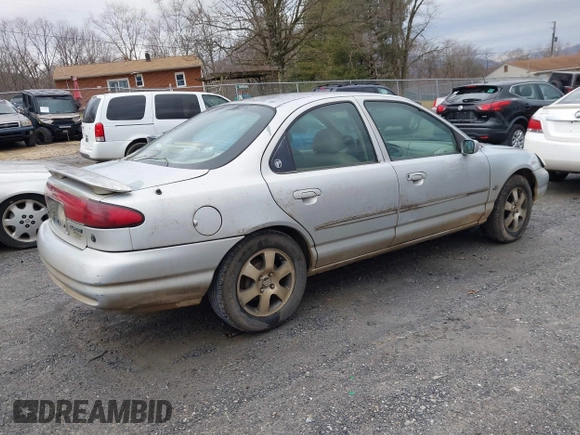 1998 Mercury Mystique z VIN 3MEFM66L2WM611980, wystawiony jako IAAI lot #41391920 z przebiegiem 199 491 mil mil oraz . Historia ofert i sprzedaży dostępna na DreamBid. Obrazek 4.