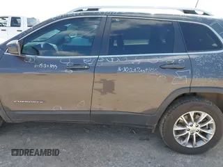 2021 Jeep Cherokee Latitude Lux with VIN 1C4PJMMX0MD235006, listed as a IAAI auction lot 42230915 with 76,264 mi miles and . Bid and sale history available at DreamBid. Image 14.