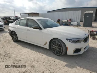 2018 BMW 5 Series M550i xDrive with VIN WBAJB9C58JG464461, listed as a Copart auction lot 53626575 with 62,436 mi miles and Salvage Title. Bid and sale history available at carsss.com. Image 4.