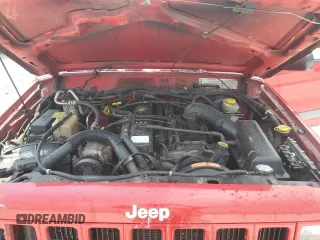 2000 Jeep Cherokee with VIN 1J4FF48S3YL257793, listed as a Copart auction lot 59932535 with 280,237 mi miles and Clean title. Bid and sale history available at DreamBid. Image 12.