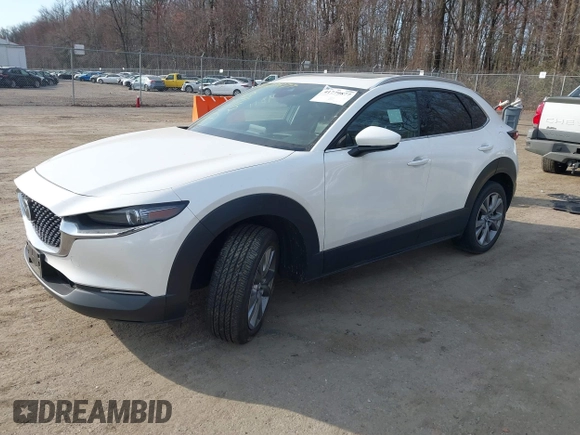 2022 Mazda CX-30 S Premium with VIN 3MVDMBDL7NM412263, listed as a IAAI auction lot 41779877 with 42,088 mi miles and . Bid and sale history available at carsss.com. Image 16.