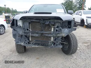 2021 Toyota Tacoma SR5 with VIN 3TMDZ5BN1MM119711, listed as a IAAI auction lot 42479038 with 64,779 mi miles and . Bid and sale history available at DreamBid. Image 6.