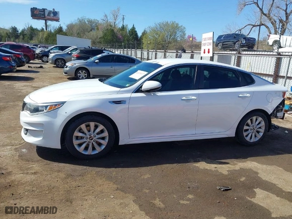 2016 Kia Optima LX with VIN 5XXGT4L30GG019255, listed as a IAAI auction lot 41870147 with 119,265 mi miles. Bid and sale history available at carsss.com. Image 15.