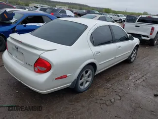 2000 Nissan Maxima GXE z VIN JN1CA31A4YT206065, wystawiony jako IAAI lot #41952514 z przebiegiem 2 953 347 mil mil oraz . Historia ofert i sprzedaży dostępna na DreamBid. Obrazek 4.