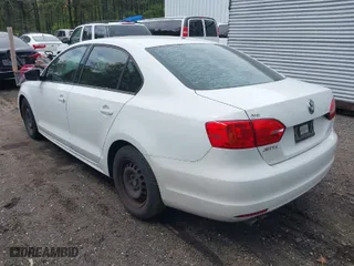 2014 Volkswagen Jetta Sedan S with VIN 3VW2K7AJ1EM298739, listed as a IAAI auction lot 42039493 with 196,900 mi miles. Bid and sale history available at carsss.com. Image 3.