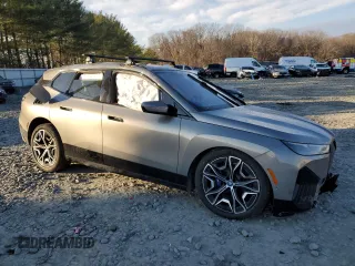 2023 BMW iX M60 with VIN WB533CF08PCK44321, listed as a Copart auction lot 88594075 with 13,829 mi miles and Salvage Title. Bid and sale history available at carsss.com. Image 4.