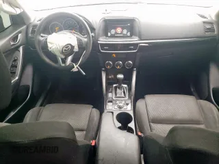 2016 Mazda CX-5 Sport с VIN JM3KE4BY3G0779206, выставлен на аукционе Copart как лот 58854805 с пробегом 144 434 миль миль и Чистый • Clean title. История ставок и продаж доступна на DreamBid. Изображение 8.