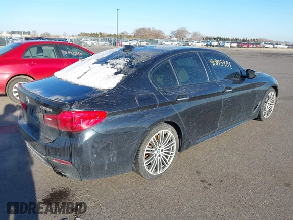 2018 BMW 5 Series M550i xDrive with VIN WBAJB9C59JG463948, listed as a IAAI auction lot 41845989 with 99,385 mi miles. Bid and sale history available at carsss.com. Image 4.